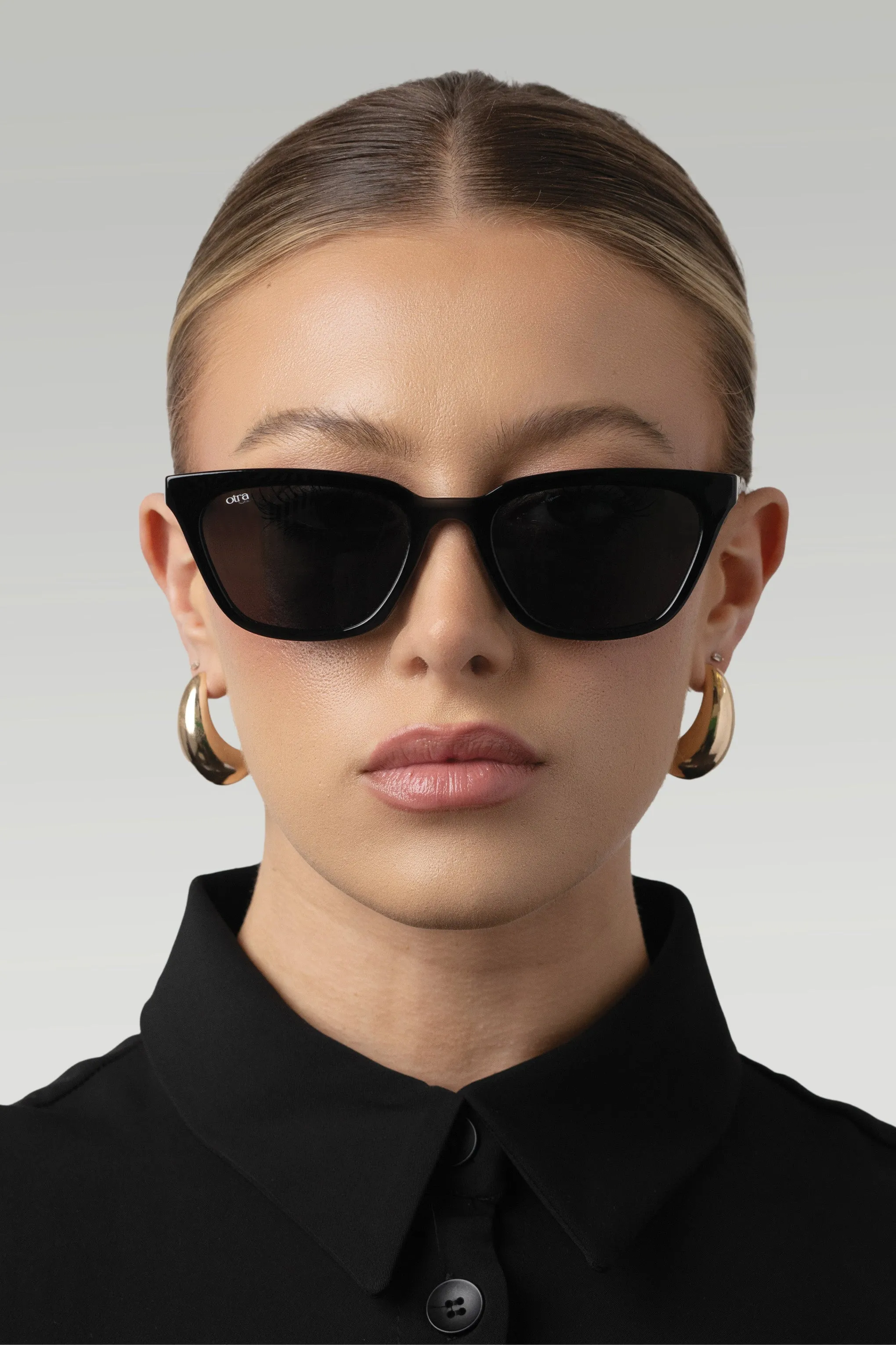 Seva | Otra Black Rounded Slim Cat Eye Sunglasses Club L London